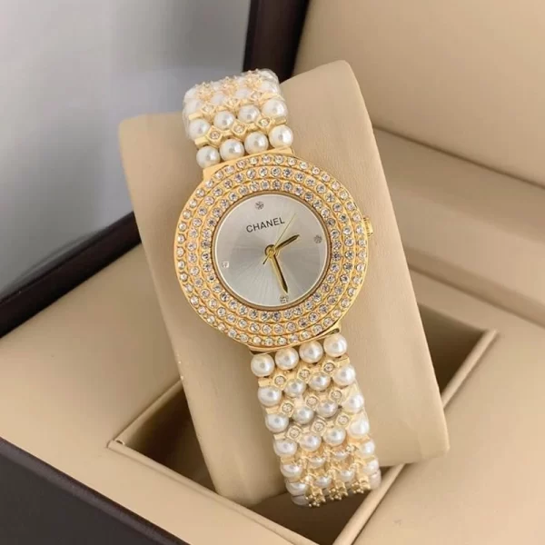 Diamond Studded First Copy Silver Dial Gold Strap Watch For Ladies